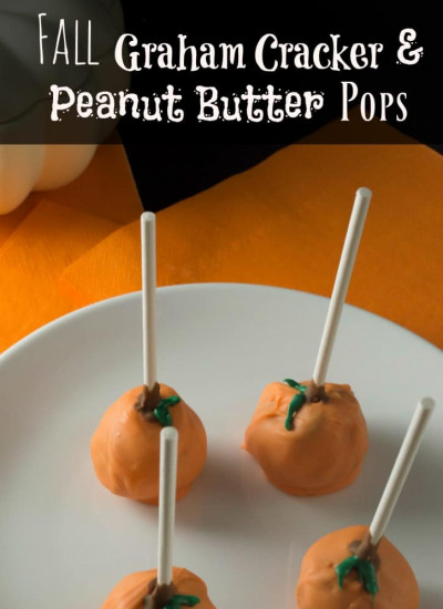 Looking for a fun, unique and delicious Fall treat? Check out these Fall Graham Cracker & Peanut Butter Pops. A fun Fall Dessert Idea.