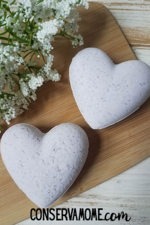 lavender scented heart bath bombs on wooden board