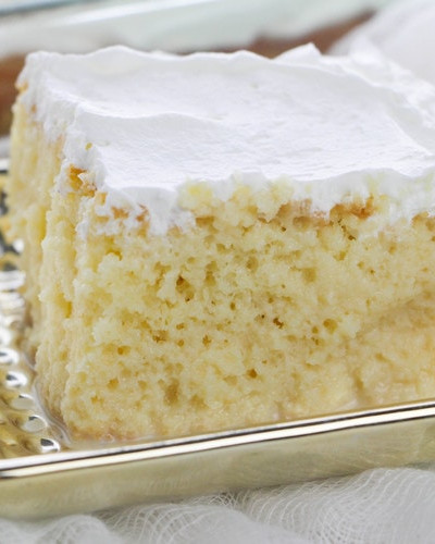 The taste and flavor of this Tres Leches Cake will make you want to skip dinner and just head straight into dessert. This delicious latin dessert recipe will become a favorite in your home.  Not only is it rich and wonderful, but it's dense and moist as well. It's one dessert recipe that you just might break the rules for. 