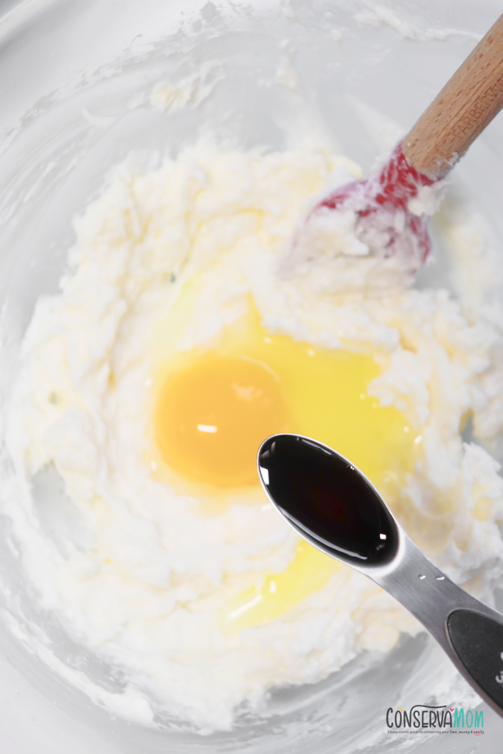 mixing in the egg and vanilla 