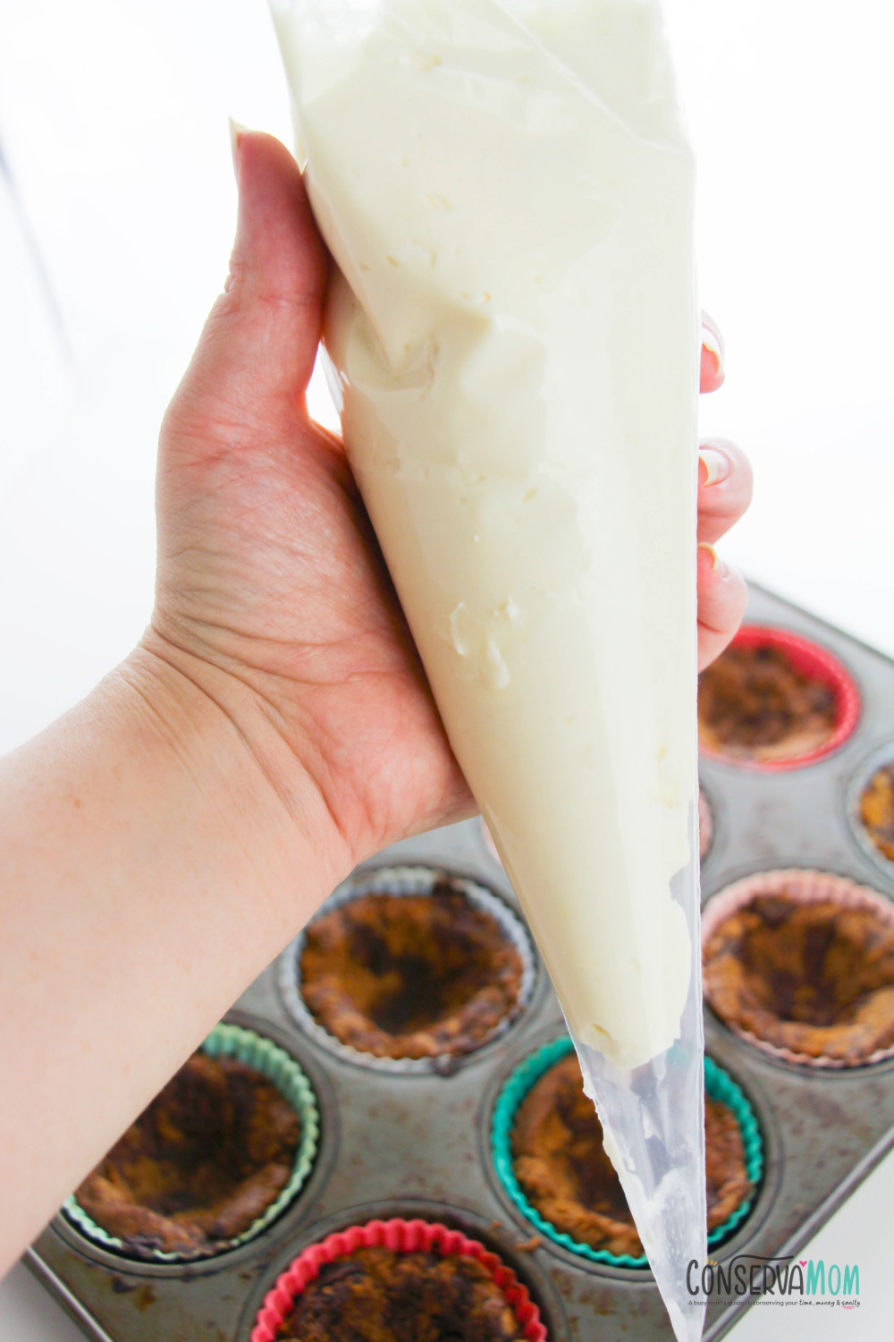 putting the cheesecake filling into the piping bag 